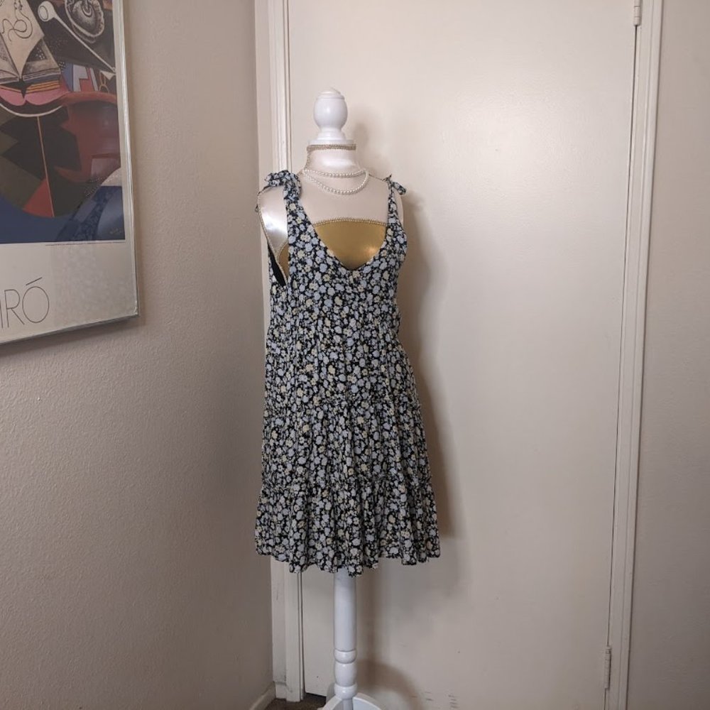 Hollister black baby doll dress with tie straps white and yellow flowers size S